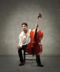 Musician playing a violoncello © olly