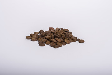 roasted coffee beans isolated in white background cutout