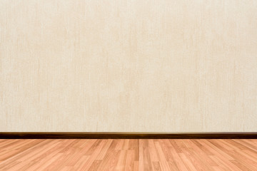 Empty room background with wooden floor cream or beige wallpaper.