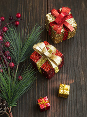 Fototapeta na wymiar Golden and Red Glittered Christmas Presents Decoration