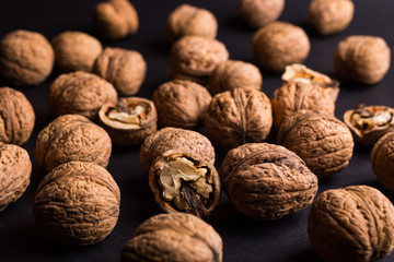 walnuts on a black background