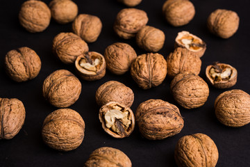walnuts on a black background