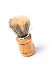 Old shaving brush isolated on white background