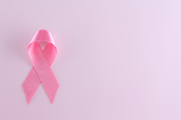 Pink ribbon sign isolated on white