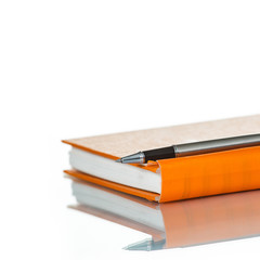 Notebook and pen