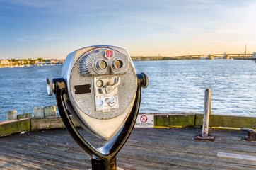 Coin-operated Binoculars on a Wooden Jetty at Sunset - Powered by Adobe