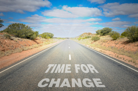 Time for Change: Conceptual image of a Desert Road with the Text on Asphalt
