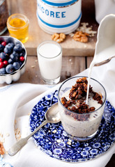 Oatmeal granola glazed with molasses, coffee, milk, fresh berries. 