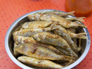 Fish surmullet in the cooking process