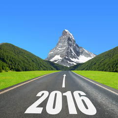 Asphalted road in mountain landscape. Forward to the New Year 2016