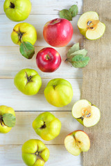 quince and apples on wooden texture