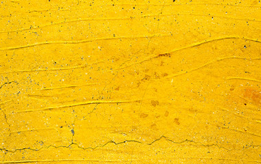 Yellow painted concrete wall texture