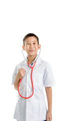 Asian boy wearing doctor's coat isolated on white.