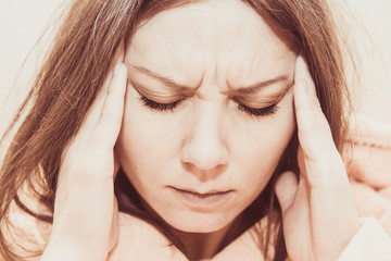 A woman with a headache