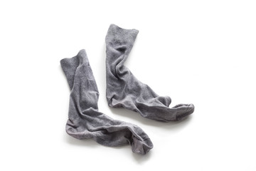Clean laundered men's socks on a white background