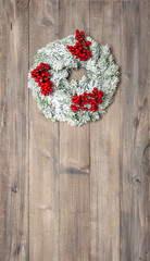 Christmas wreath with red berries. Festive decoration