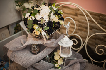 beautiful bouquet of bright white rose and black decor