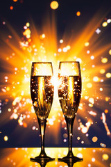 champagne glass against sparkler background