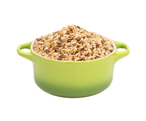 Raw brown rice in ceramic pot