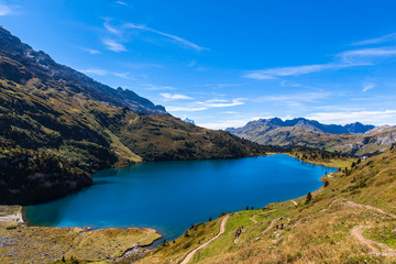 Aerial view of Engstlensee lake and the Alps