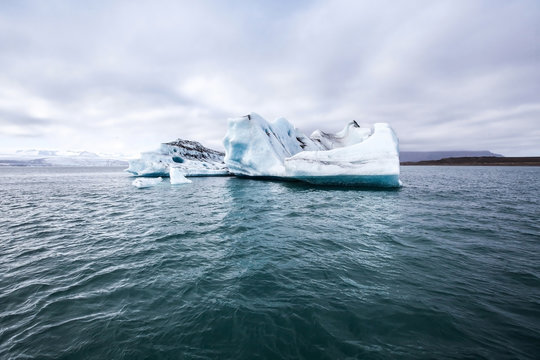 melting iceberg, global warming background