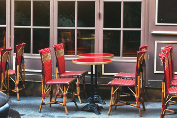 street restaurant in Paris with wicker chairs