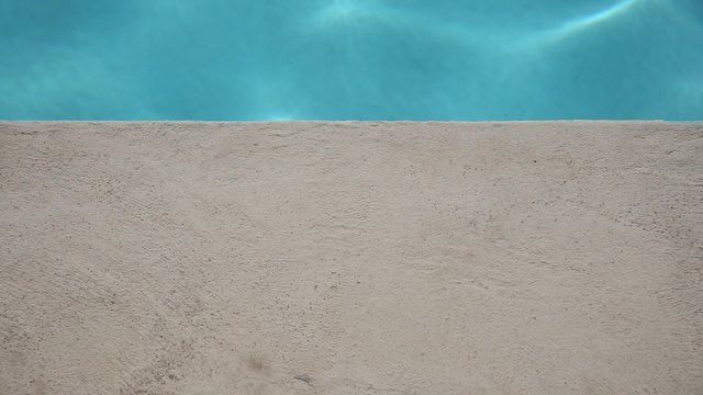 Edge of swimming pool 
