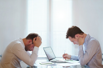 tired business men, financial crisis in business