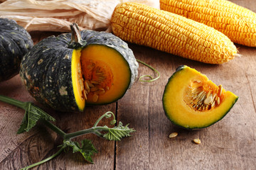 pumpkins with leaves and dried corn