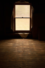 Sunlight Through Window of Abandoned House