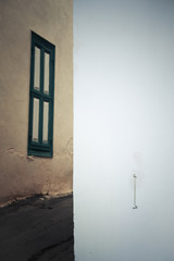 Abstract fragment of the old village in Cyprus. Wall and Window. Vintage style