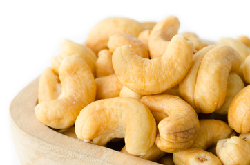 Cashew in wooden bowl.