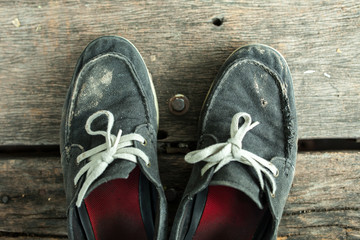 old and dirty canvas shoes from traveling 