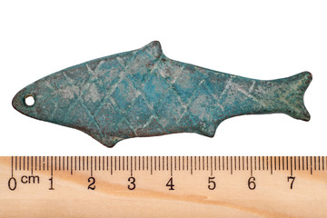 Ancient bronze coins in the form of fish Zhou Dynasty. China. Isolated on white