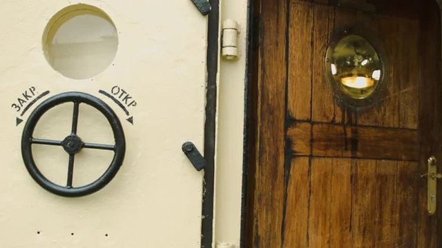 Door and hatch on a soviet ship in Russia