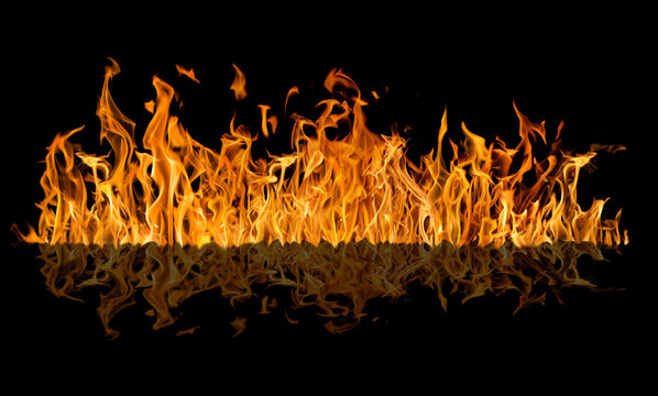 yellow fire long strip with reflection isolated on black