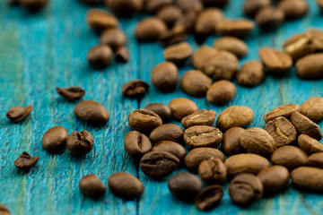coffee beans on old blue wooden background
