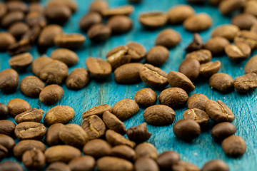 coffee beans on old blue wooden background