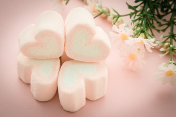 sweet heart shape of pink marshmallows.
