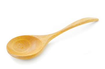 Used wooden spoon isolated