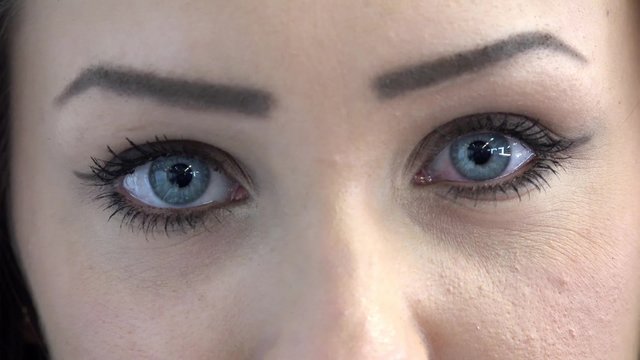 eyes of young attractive woman - detail (closeup)