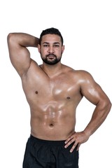 Fototapeta premium Muscular man flexing for camera