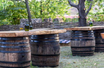 Fototapeta premium Wine bottle vintage composition on a wooden table