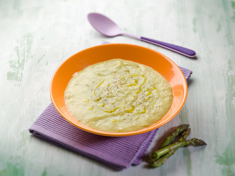 asparagus cream with olive oil,  selective focus