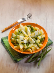 potatoes salad with  green beans and boiled eggs, selective focu