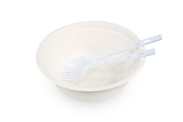 Paper food container with plastic spoon and fork on white backgr