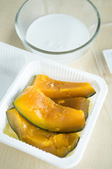 Pumpkin with coconut milk in styrofoam box