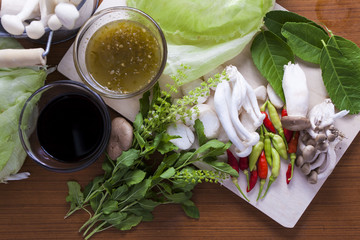 Ingredients for Thai food. chili, mushroom, sauce hairy basil, lemon leaf, soy sauce