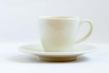 White coffee cup on a white background