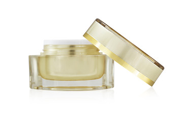 Blank gold facial cream jar isolate on white background
